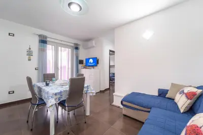 Area soggiorno di Appartamento moderno a 500 MT dalle sabbie bianche