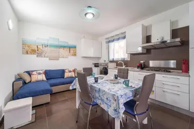 Cucina o angolo cottura di Appartamento moderno a 500 MT dalle sabbie bianche