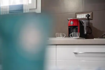 Set per la preparazione di tè e caffè presso Appartamento moderno a 500 MT dalle sabbie bianche
