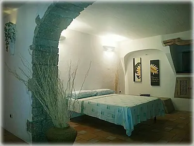 Letto o letti in una camera di Sardegna casa a 250 metri dal mare con piscina