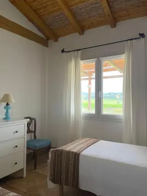 Letto o letti in una camera di Auberge Santu Martine: cottage with pool (Vinza)