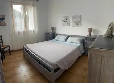 Letto o letti in una camera di CASA MONICA