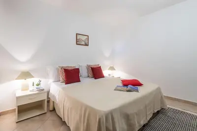 Letto o letti in una camera di AffittaSardegna-Casa Rosa Dei Venti