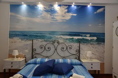 Letto o letti in una camera di B&B LE DUE ISOLE