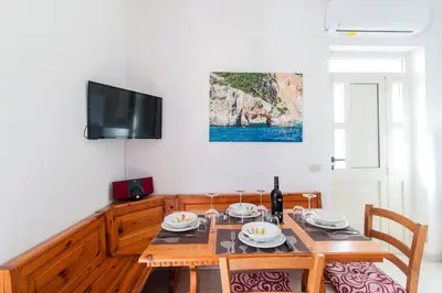 TV o dispositivi per l'intrattenimento presso Suite Apartment La Punta