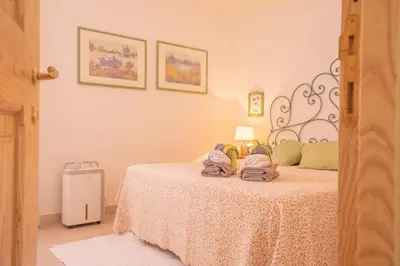Letto o letti in una camera di Casa Turchese