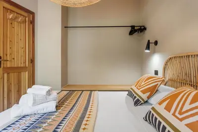 Letto o letti in una camera di Baia Dorata beach apartments