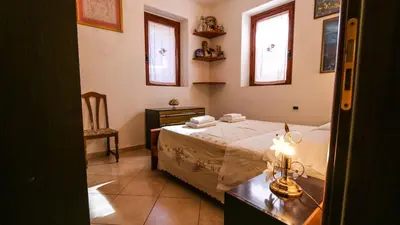 Letto o letti in una camera di Casa Pia
