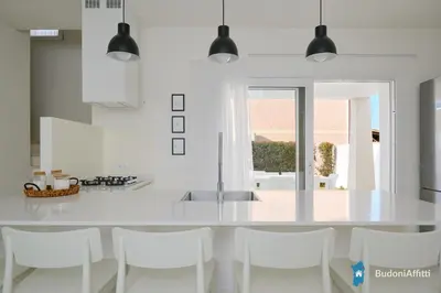 Cucina o angolo cottura di Villetta indipendente al centro di BudoniAffitti