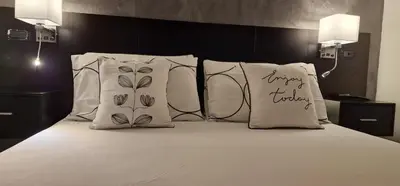 Letto o letti in una camera di Appartamento Camilla