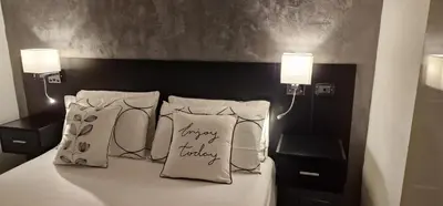 Letto o letti in una camera di Appartamento Camilla