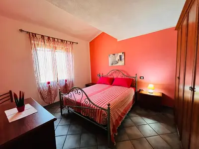 Letto o letti in una camera di Appartamenti San Teodoro I - II