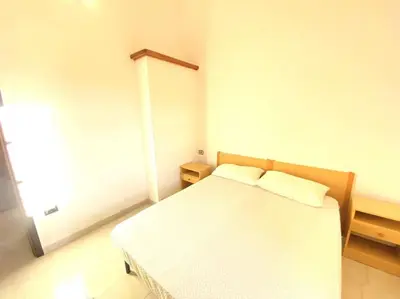 Letto o letti in una camera di Casa Trentino 2