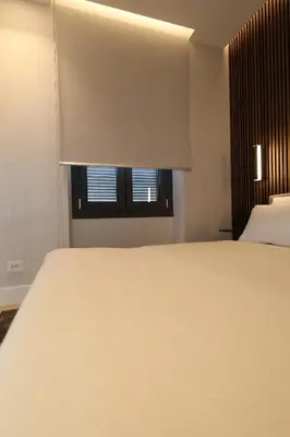 Letto o letti in una camera di Renovated & fully equipped-Luxurious-2Room Fontana Suite, it just doesn't get any better!