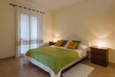Letto o letti in una camera di Le Perle Di Golfo Aranci