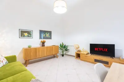 TV o dispositivi per l'intrattenimento presso Maria House con giardino privato