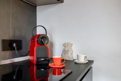 Cucina o angolo cottura di Luxurious BIG holiday Town House - Large Terrace - Historical Centre - High Quality - Fully Equipped - Renovated