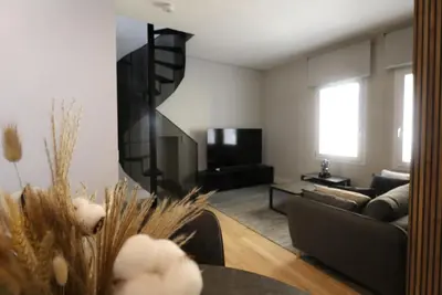 TV o dispositivi per l'intrattenimento presso Luxurious BIG holiday Town House - Large Terrace - Historical Centre - High Quality - Fully Equipped - Renovated