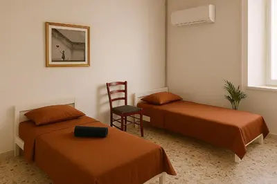 Letto o letti in una camera di Flat in Olbia Centro