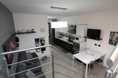 Cucina o angolo cottura di Corona's Apartment- Fronte Spiaggia