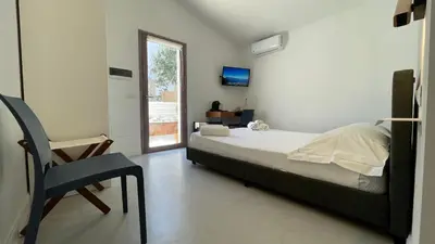 Letto o letti in una camera di La Casa dei Nonni