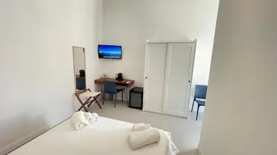 Letto o letti in una camera di La Casa dei Nonni