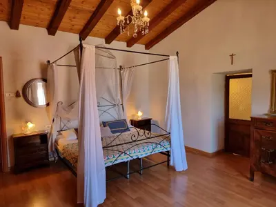 Letto o letti in una camera di Casa Monte Rena