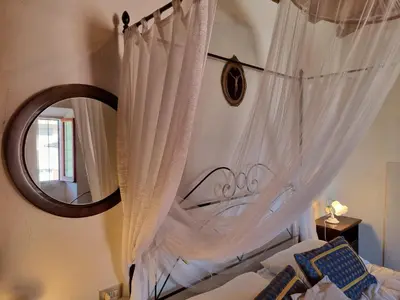 Letto o letti in una camera di Casa Monte Rena
