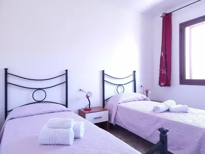 Letto o letti in una camera di Appartamento La Paduledda