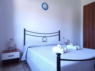 Letto o letti in una camera di Appartamento La Paduledda