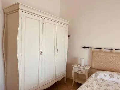Letto o letti in una camera di Villa a Golfo Aranci con Vista su Tavolara