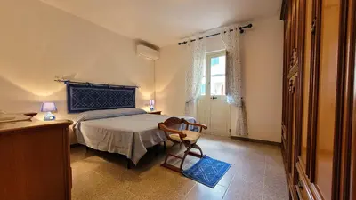 Letto o letti in una camera di Casa Antonietta