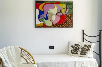 Letto o letti in una camera di Villa La Maison D'Anna Maria - LT - PMS CaseVacanze