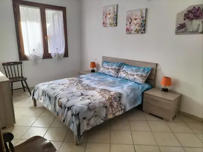 Letto o letti in una camera di Residenza Sa Conzola